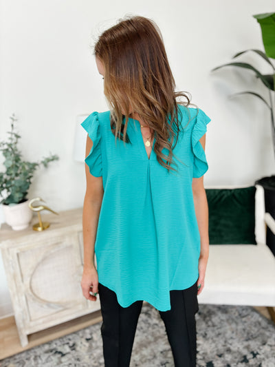 Woven Airflow Ruffled Sleeve High-Low Top in Light Teal